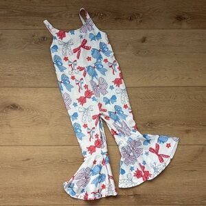 Girls White Ruffle Hem Jumpsuit with Red & Blue Bow Print